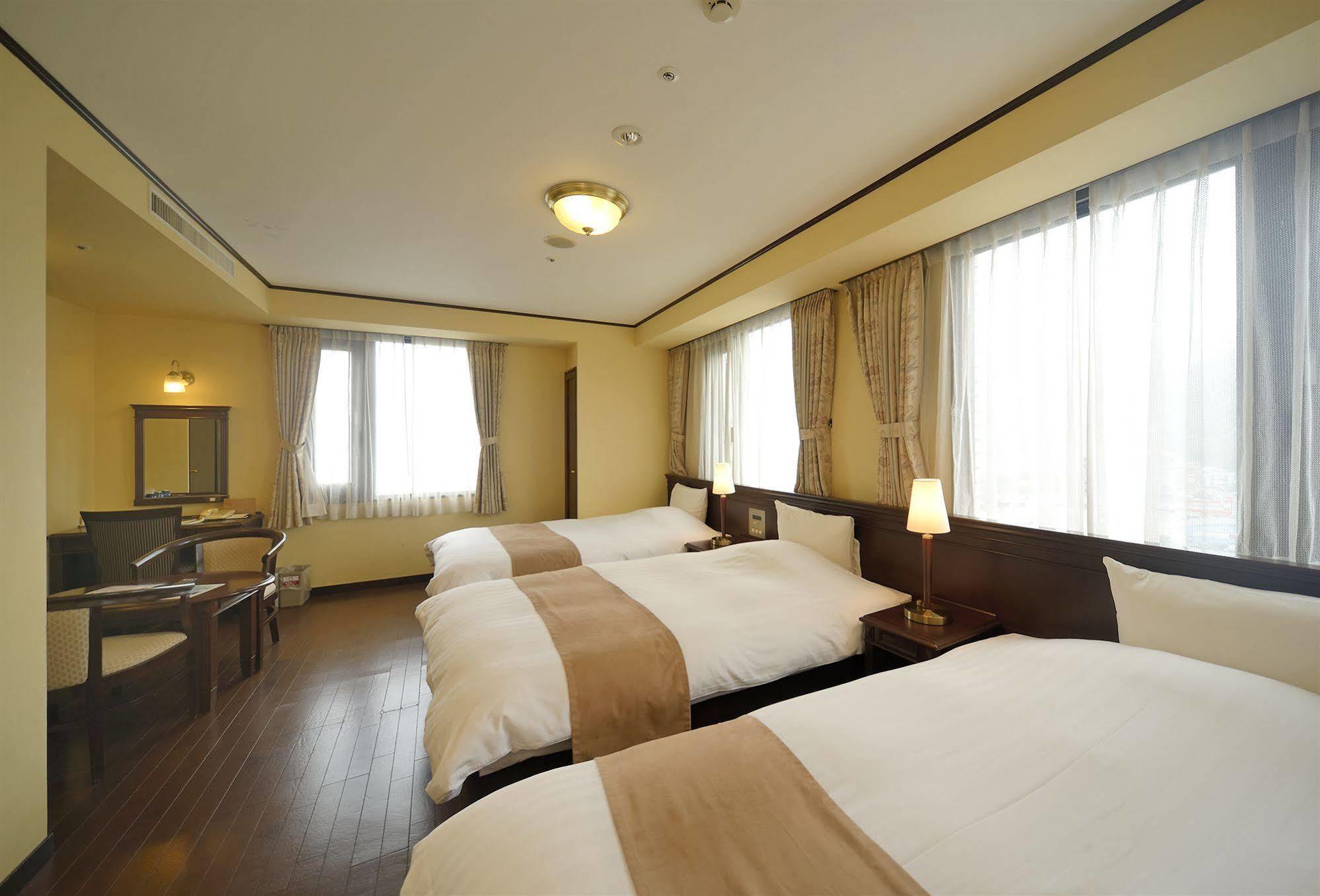 Amami Sunplaza Hotel Exterior foto
